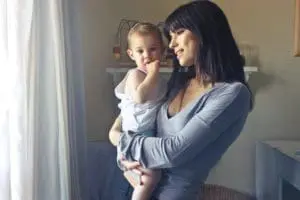 Mother holding her baby